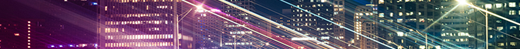 Motion-blur-of-business-district-office-buildings-GettyImages-1415812344_735x70.jpg