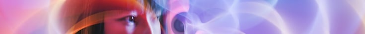 Abstract, digitally enhanced portrait of a person in profile,  overlaid with swirling, translucent light patterns in shades of blue, purple and white. The background is soft and blurred, with concentric, wave-like shapes suggesting motion or data flow. The overall composition combines human imagery with futuristic, technology-inspired visual elements.