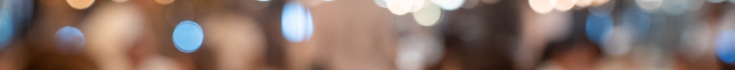 Blurry image of a gathering of people